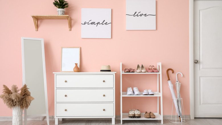 pink foyer with umbrellas