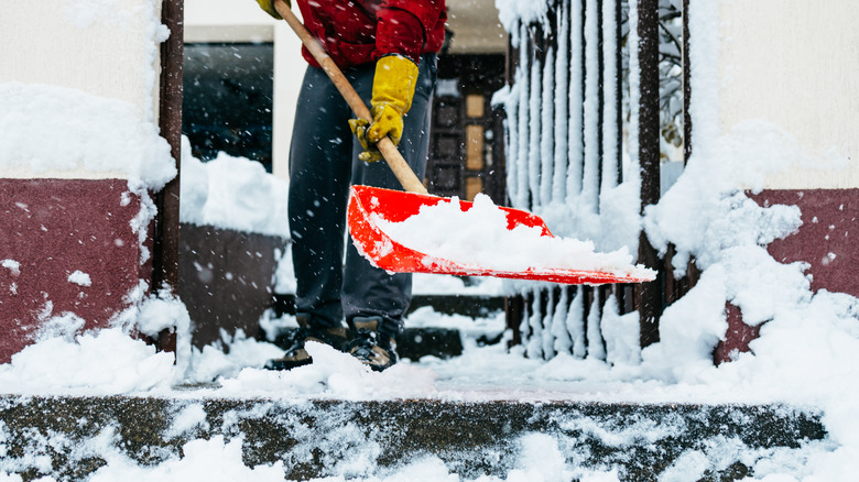 man shoveling snow