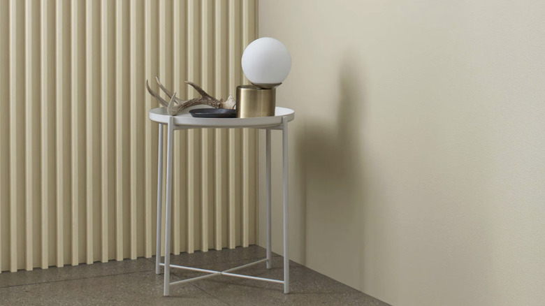 A corner with a textured and flat wall painted a warm cream color