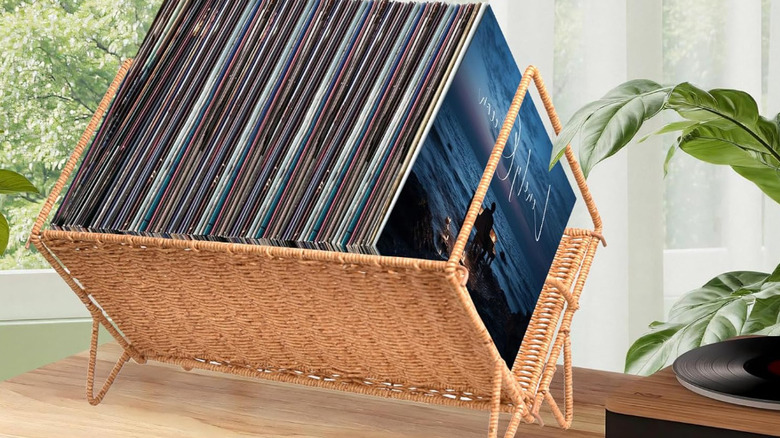 The wicker Demine record holder filled with vinyl records