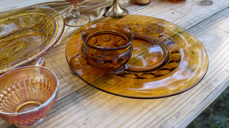 Mismatched glassware and copper cup