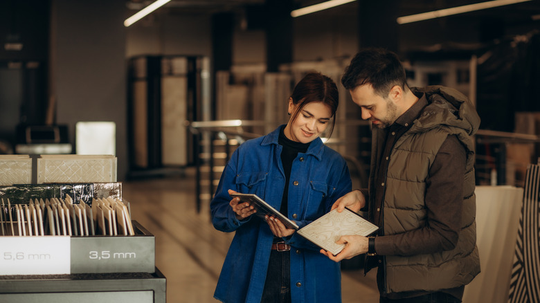 couple picking out tile