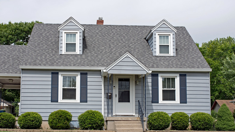 Exterior of light blue Cape Cod