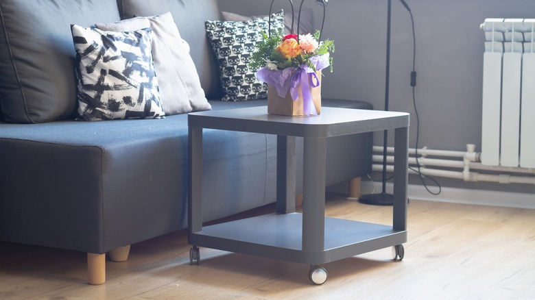 deep gray accent wall with gray couch