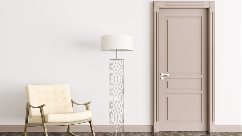 Beige interior door and chair