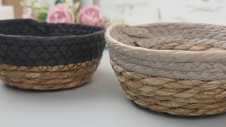 Dollar Tree woven baskets sit on a countertop.