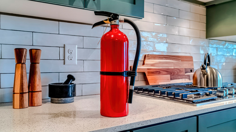 fire extinguisher on kitchen counter