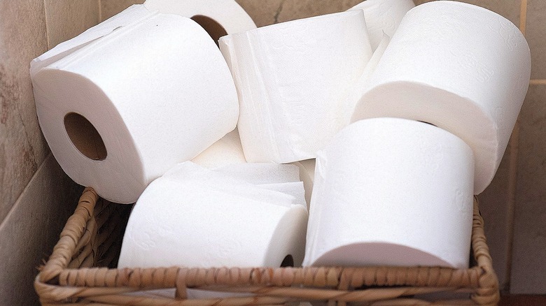 Toilet paper rolls in basket