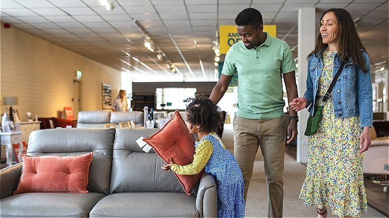 Family shopping for sofa