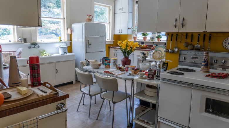 1960s kitchen with white cabinets