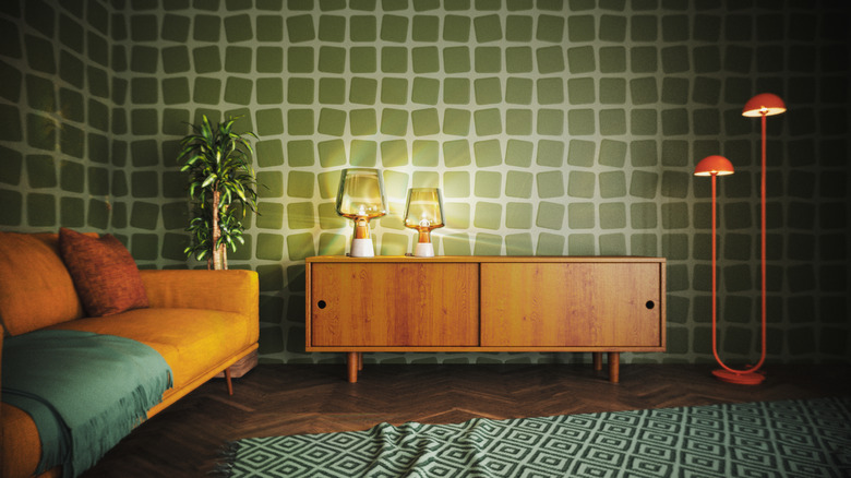 Retro living area with low sideboard, geometric wallpaper, and funky lights