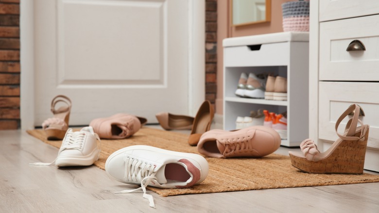 scattered shoes in entryway