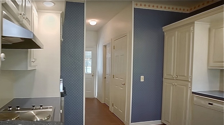 kitchen with blue wallpaper