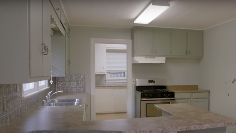 small kitchen with granite countertops