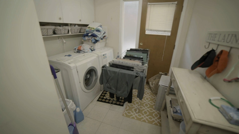 cluttered laundry room
