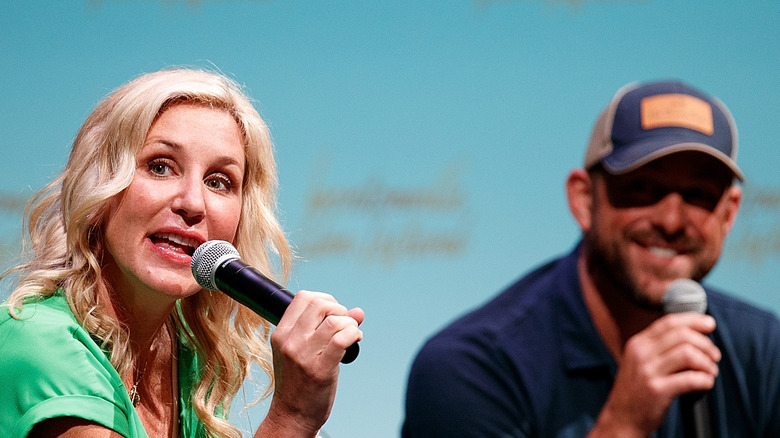 jenny and dave marrs holding microphones