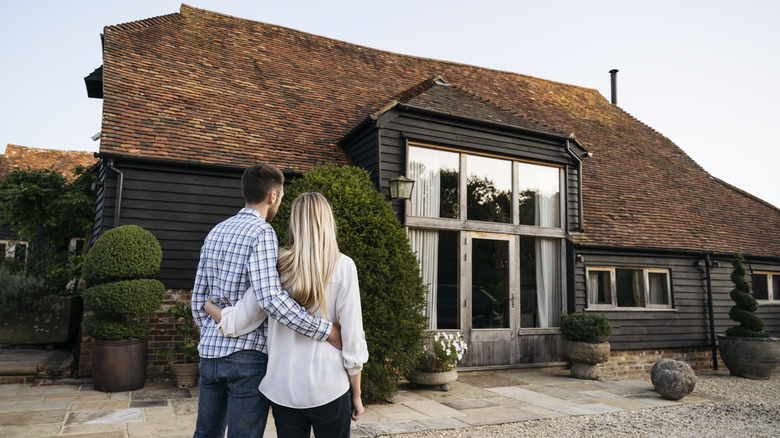 couple looking at house