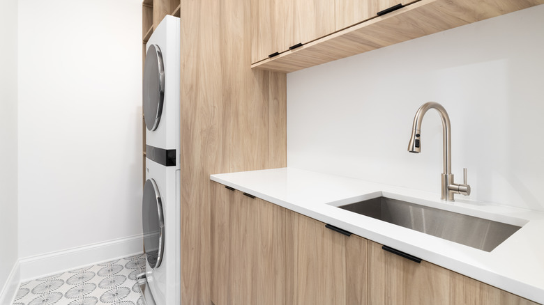 Laundry room with marble counter