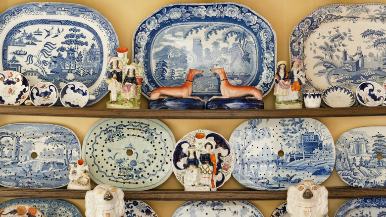 China plates and knick-knacks on shelves