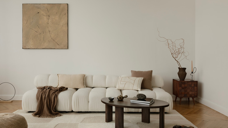 A minimalist living room with beige walls