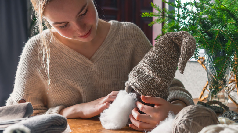 woman making homemade gnome