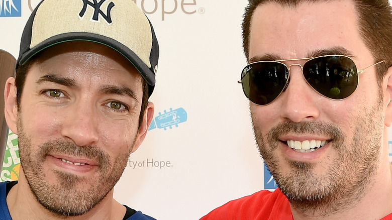 Drew and Jonathan Scott smiling