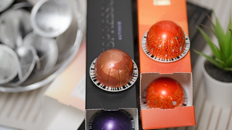 Nespresso pods sitting on top of boxes