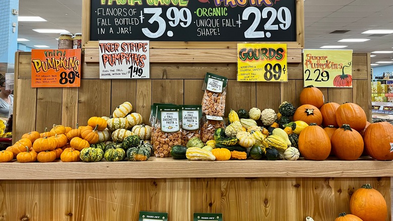Pumpkins and gourds on sale in the grocery store