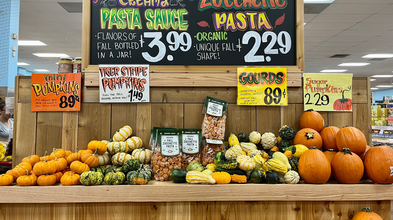 Pumpkins and gourds on sale in the grocery store