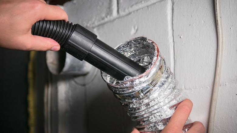 Vacuuming out a dryer vent duct