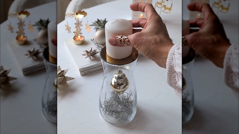 DIY winter candle holder made out of IKEA vase