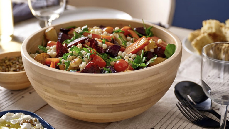 IKEA BLANDA MATT salad bowl filled with a salad sitting on a dining table