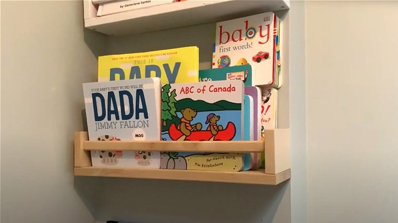 A BEKVÄM spice rack as children's book storage