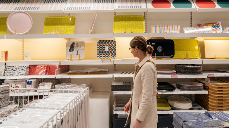 A customer shopping inside an IKEA store.