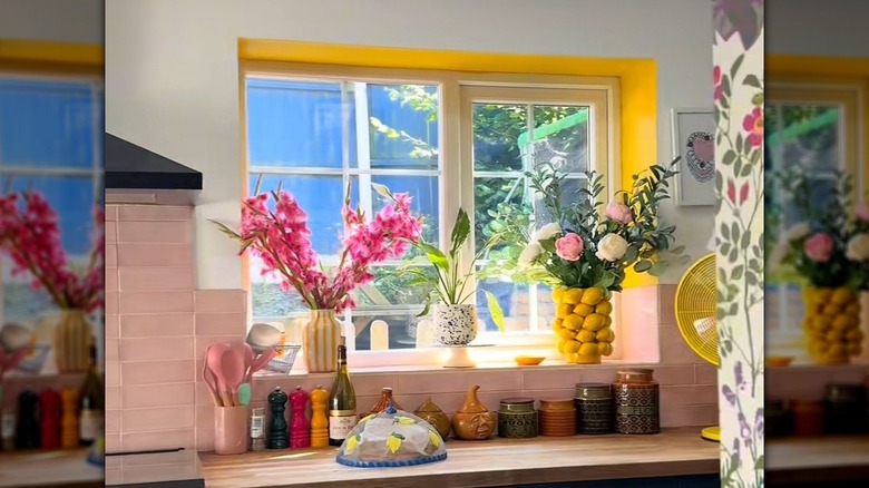 A kitchen recessed window painted yellow