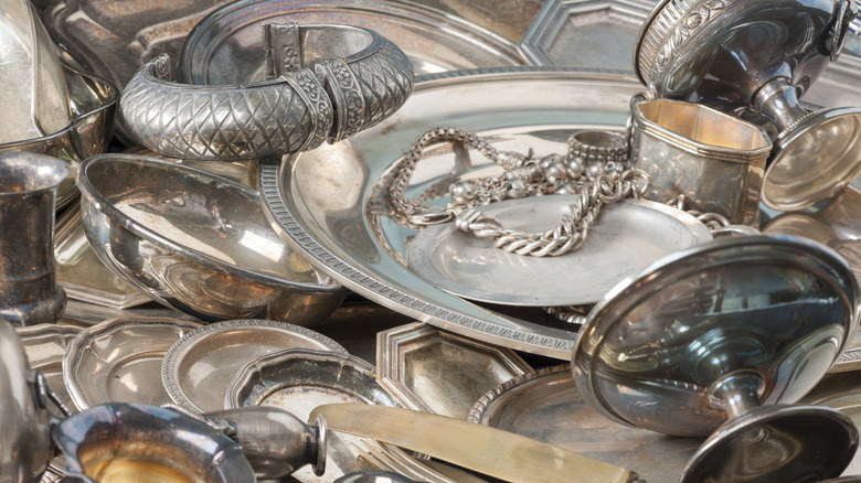 Antique silver pieces from jewelry to silverware