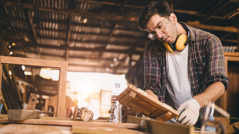 A man working in a wood shop