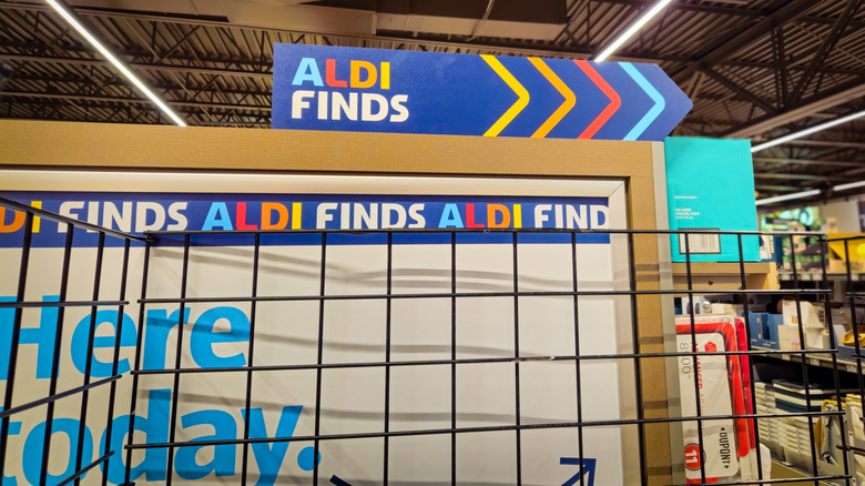 Signage advertising Aldi Finds in an Aldi grocery store