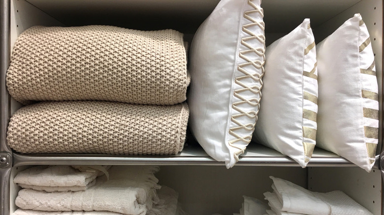 Blankets and pillows in closet