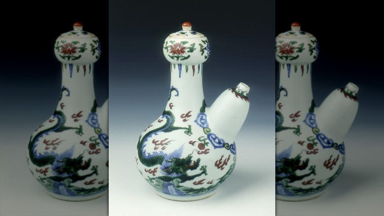 A wucai porcelain piece with an elaborate dragon motif.