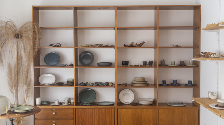 shelves filled with handmade ceramics
