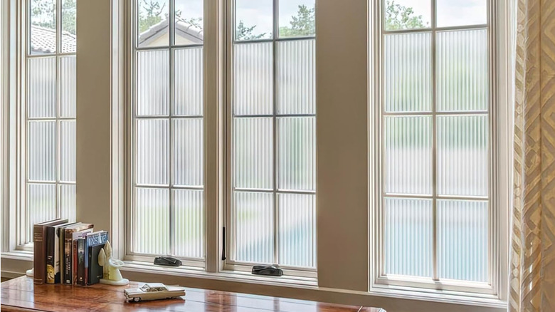 Windows with a reeded glass film applied.