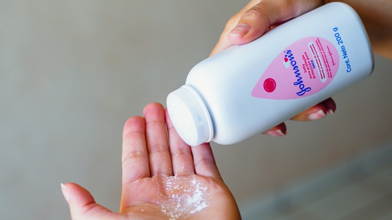 Baby powder poured into a hand