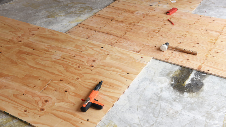 Subfloor installation, hammer and nailer