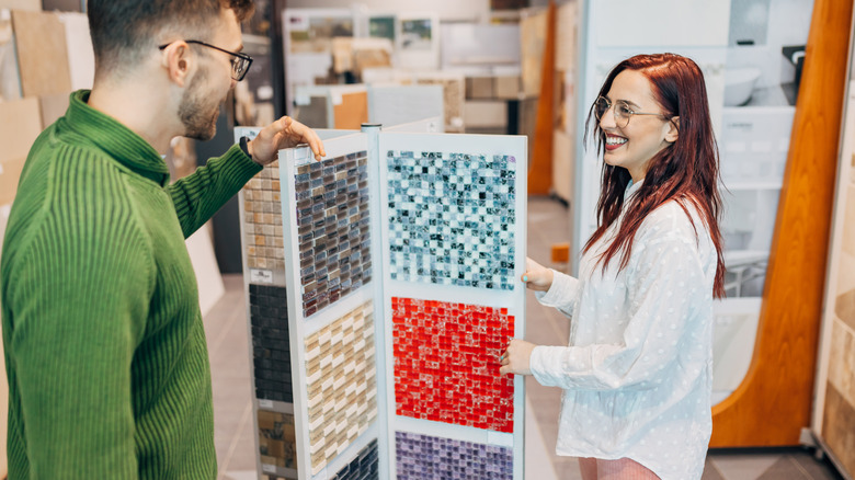 Couple looking at backsplash options