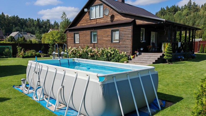 an above ground pool in a backyard