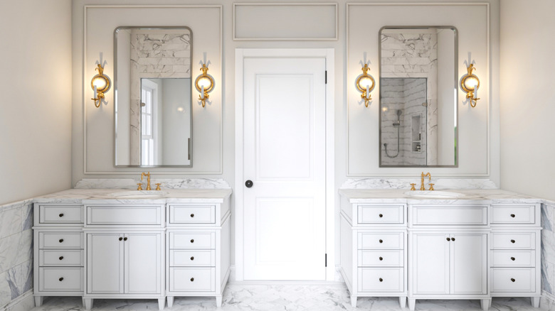 updated bathroom with wall sconces
