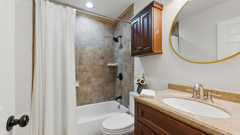 Small neutral bathroom and shower