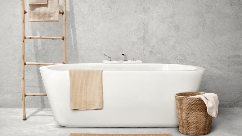 cement bathroom with tub