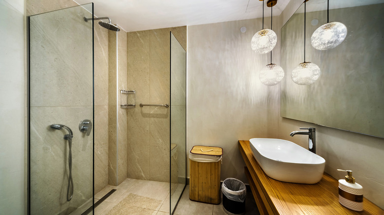 A contemporary bathroom with a walk in shower.